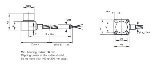 CA201 piezoelectric accelerometer shown from a second angle, highlighting the mounting base and cable connection