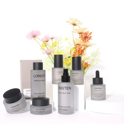 China Luxury Round Skincare Glass Bottle For Cosmetic Cream Toner Lotion for sale