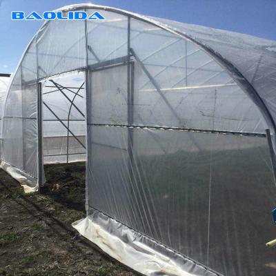 China Arch Pipes Reinforced Commercial Polyethylene Film Greenhouse for sale