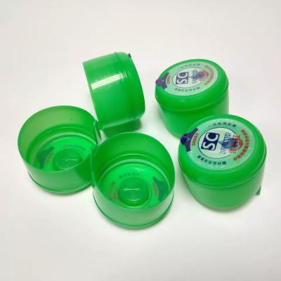 China Green Color PE Non Spill Caps Peel Off Type Rubber Liner For 5 Gallon Water Bottle for sale
