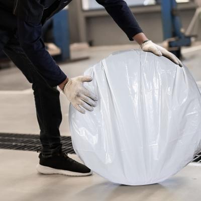 Chine La larme lavable résistante de sac de stockage de pneu de voiture rendent les sacs en plastique résistants de pneu de voiture blanche noire d'enjoliveur à vendre