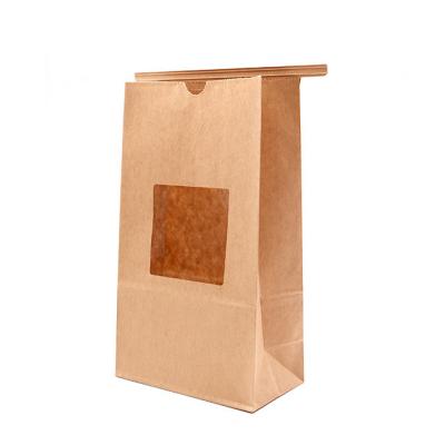 China 8 Color Flexo Printing Brown Kraft Food Bags With Strong Bottom Clear Window for sale
