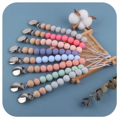 China Eco Friendly Pacifier Chain Clip Holder Dummy Loop Silicone Teether Bead Holder for sale