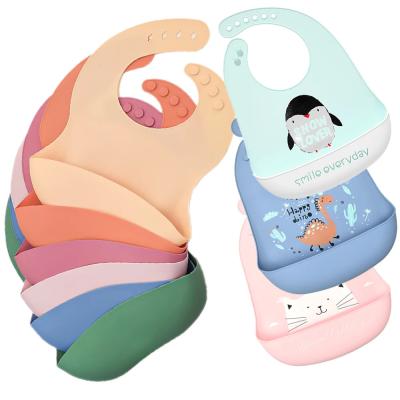 China Animal Pattern Waterproof Infant Bibs Silicone Plain Baby Drooling Bib en venta