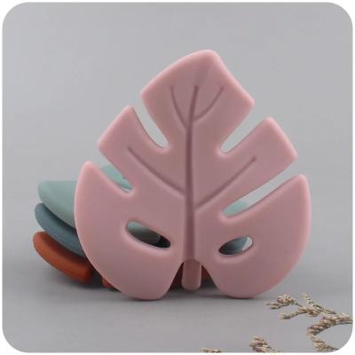 China Molar Infant Chew Toys Leaf Shape Food Grade Silicone Baby Teether en venta