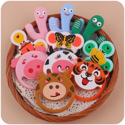 China BPA Free Newborn Teething Toys Food Grade Silicone Teether Baby Toys à venda