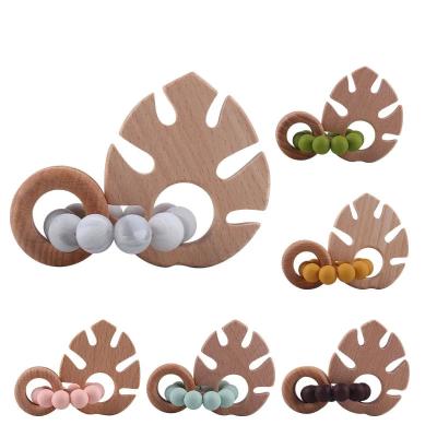 Chine Food Grade Silicone Teether Toy Rattle Soft BPA Free Cartoon Wood Teether Ring à vendre