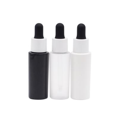 China Garrafa de óleo essencial vazia plástica cosmética preto e branco da garrafa 30ml do conta-gotas à venda