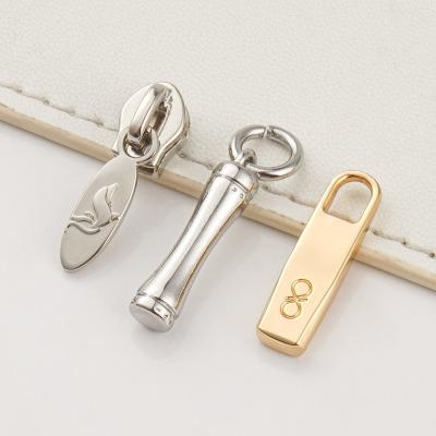 China Customized Non Lock Slider 3 Engraved Zipper Puller Nickel Metal Zipper Slider for Bags en venta