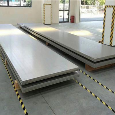 China Placa de acero inoxidable 310 estándar JIS 1000-6000 mm con borde de molino en venta