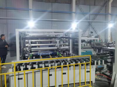 China Compact Floor Wrapping Machine Adhesive Packaging Machine for sale