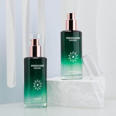 China la botella de la loción del vidrio de la belleza 55ml heló la loción que el regalo cosmético de la botella fijó el verde de empaquetado de Skincare en venta