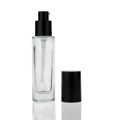 China Hot Selling Round Cosmetic Lotion Bottle Glass Foundation Bottle for sale