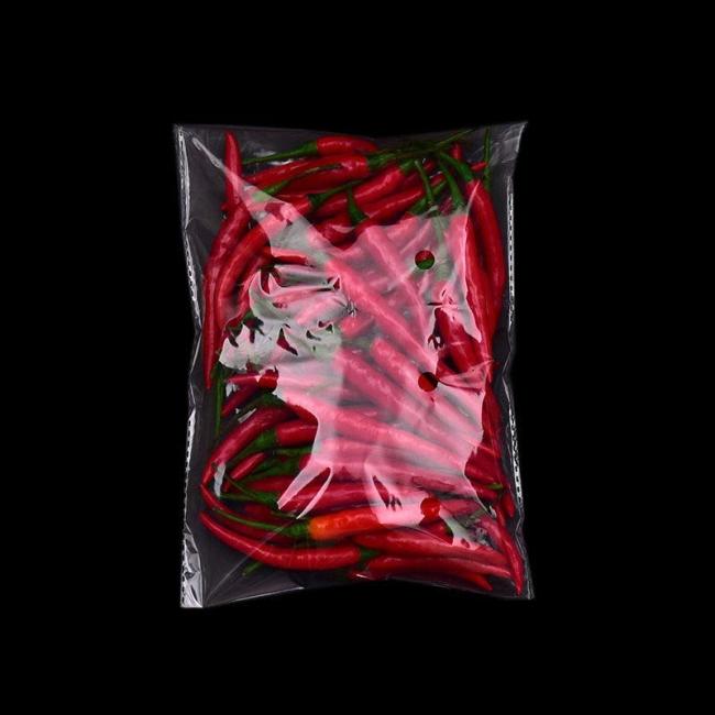 Close-up view of micro perforations on vegetable packaging bag