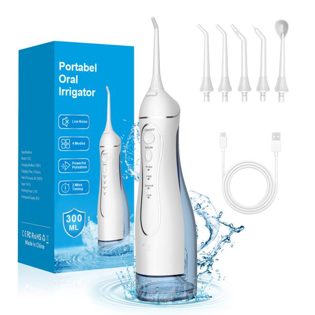 Dental irrigator with accessories showing complete set components
