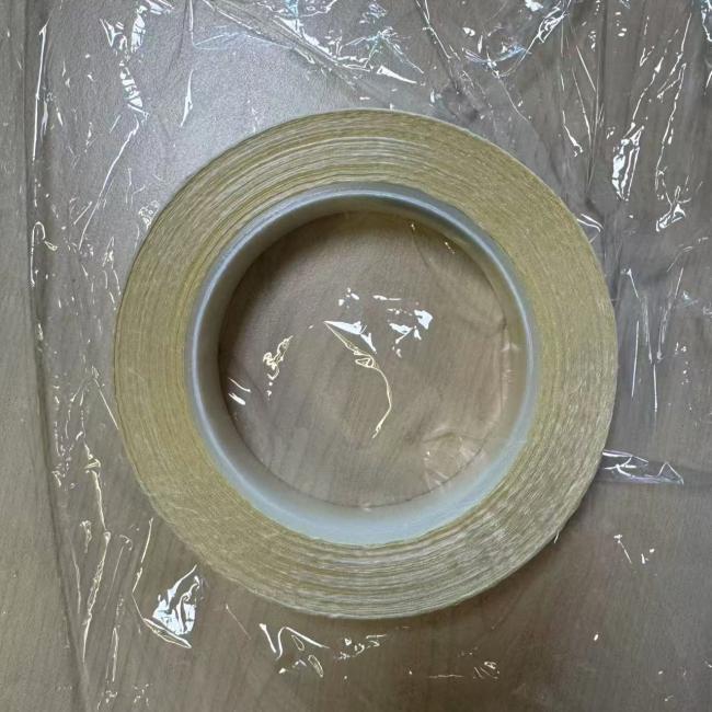 Close-up view of fiberglass cloth tape showing texture and adhesive surface