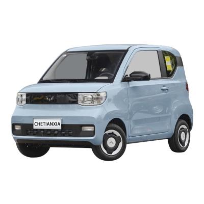 China Stylish pure Mini EV Cars Wuling Hongguang safety 4 seater small car for sale