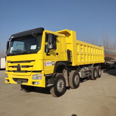 China Hot sale sinotruk dump truck howo 8x4 12 wheeler 40T dump truck for sale > 8L for sale