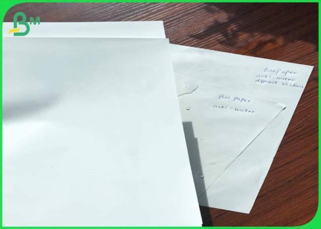 Nonacid Anti folding tear proof 60gsm 80gsm 100gsm 120gsm 150gsm synthetic stone paper in roll package Nonacid Anti folding tear proof 60gsm 80gsm 100gsm 120gsm 150gsm synthetic stone paper in roll package