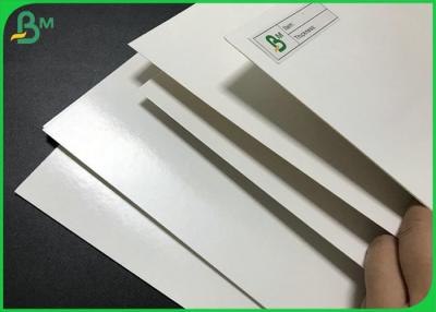 China Glossy PE Coating Paper 300g + 15g LDPE Laminated White Fbb Cardboard Sheets for sale