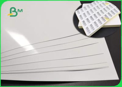 China Espejo blanco superior del papel adhesivo revestido brillante del molde como etiqueta engomada de la capa 80gsm + 85gsm en venta