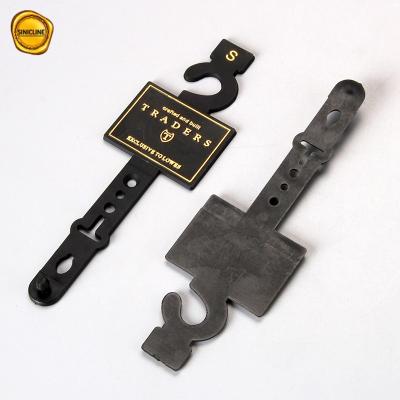 China Gold Foil Stamping Logo Plastic Belt Hangers For Closet for sale