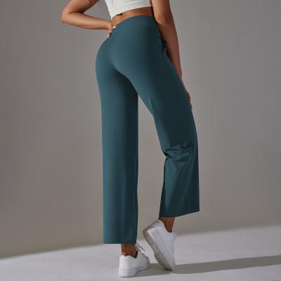 China Sanded breathable high-waisted stretch loose casual pocket wide-legged cropped pants running fitness yoga leggings for sale