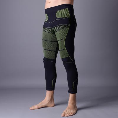 China Men running pants with compression, black color with green.   Xll003 for sale
