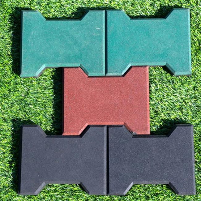 Close-up of dog bone shaped rubber tiles