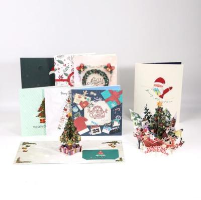 China El papel de arte personalizó la tarjeta de felicitación tridimensional de la Navidad de las tarjetas impresas en venta