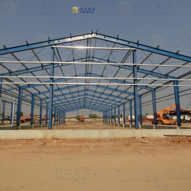 Interior view of steel structure building showcasing wide span and structural elements