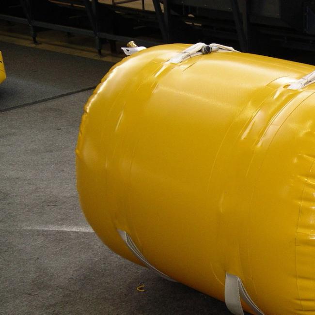 Multiple salvage tubes arranged for large-scale marine recovery project