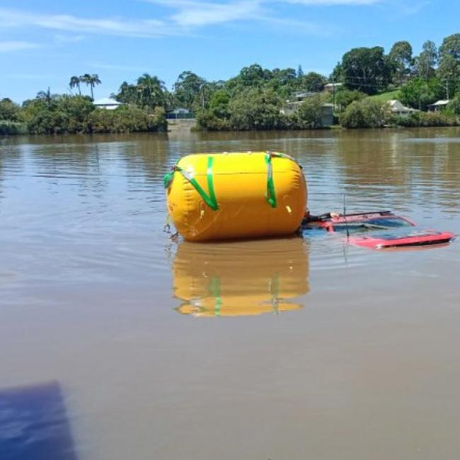 Inflatable Salvage Tube deployed underwater for vessel lifting operation
