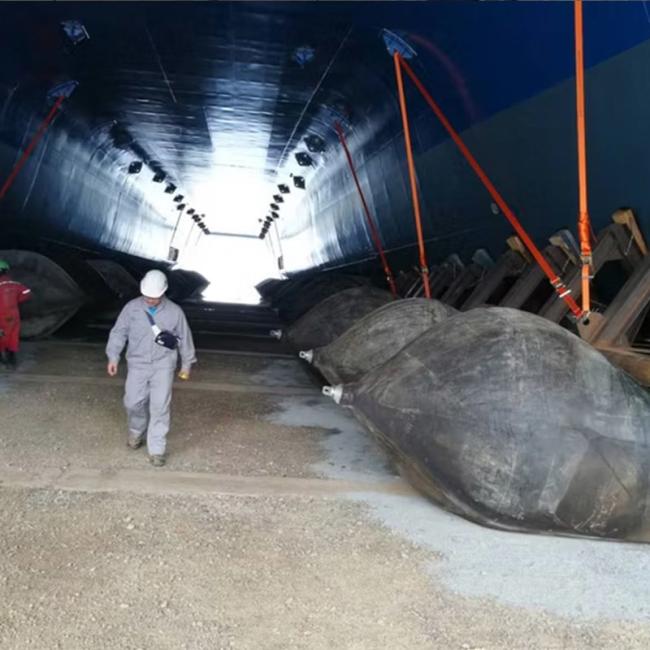 Marine airbags in operation during ship launching