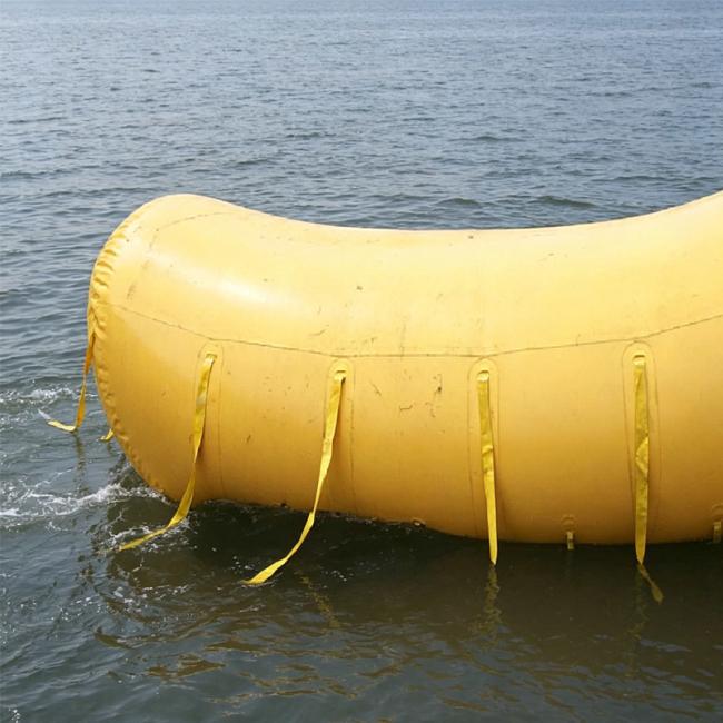 Close-up view of cylindrical air lift bag in operation