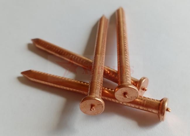 Close-up of CD Weld Stud Pins showing copper coating