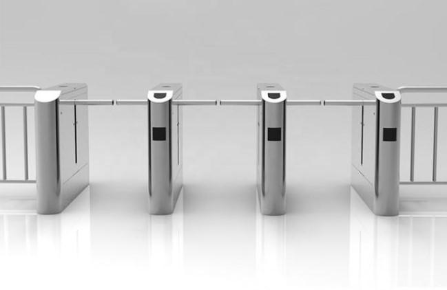 Turnstile installation in commercial environment showing access control application