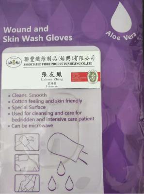 中国 アロエのヴィエラの傷および皮の洗浄手袋TRUTZSCHLERのNonwovenの生地 販売のため