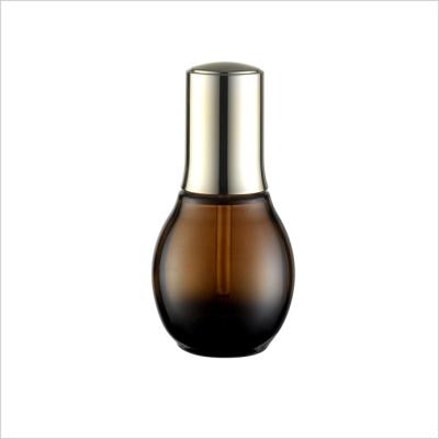 China 30ml 50ml Amber Spherical Luxury Dropper Bottle Gold Switch Dropper Cap Massage Oil Glass Bottle for sale