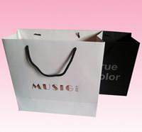 2017 custom elegant folded shopping paper bag with gold embossed logo