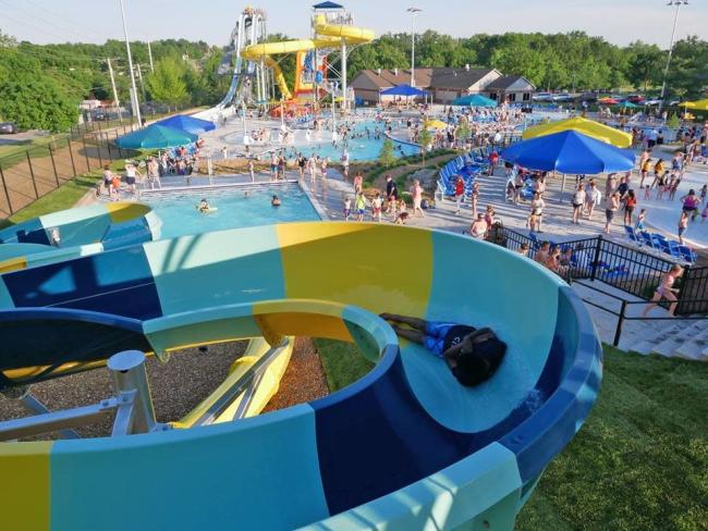 Close-up view of fiberglass water slide surface and structure