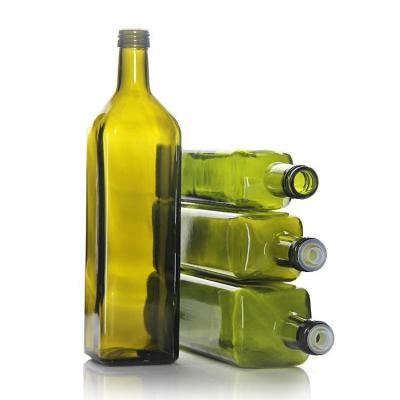 China 250 ml de vinagre comestible botella de vidrio de aceite verde ámbar claro OEM en venta