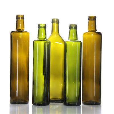 China ODM Green Olive Glass Oil Bottle Container With Pump Head 17oz for sale