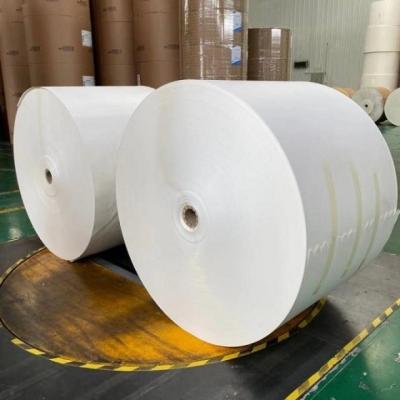 China Smooth C2S Art Board Roll High Bulk C2S Paperboard 700*1000MM for sale