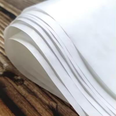 China Papel de silicone à prova de gordura de qualidade alimentar Embalagens de papel de cozinha para sobremesa à venda