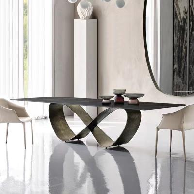 China Wings Ceramic Stainless Steel Marble Dining Table Modern 8 People for sale