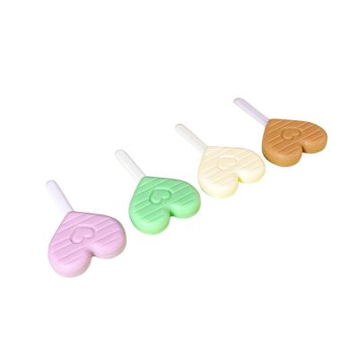 China Food Grade Silicone Dental Chewies For Aligners Heart Shaped With Handle for sale