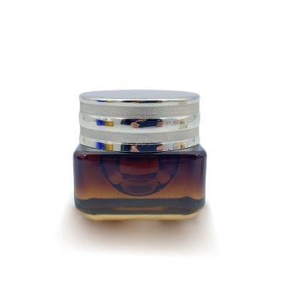China Personalización Embalaje cosmético vacío Botella de vidrio Contenedor de crema 55 * 76mm en venta