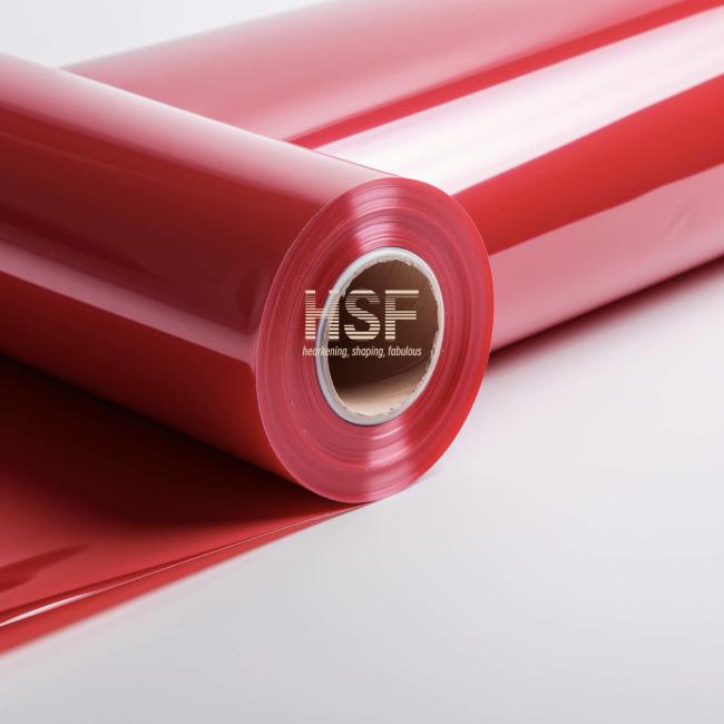 Close-up view of red cast polypropylene silicone coated release film demonstrating transparency and surface quality