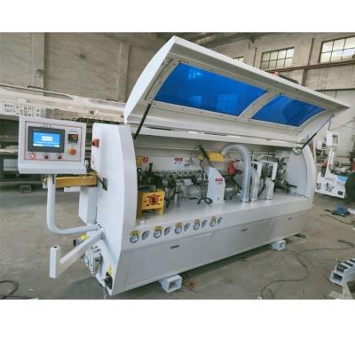 China CNC Full automatic pvc mdf wood working edge banding machine price for sale for sale